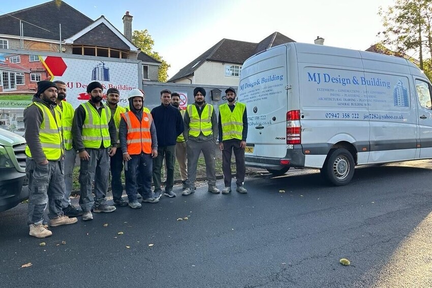 MJ Design and Building crew with company van