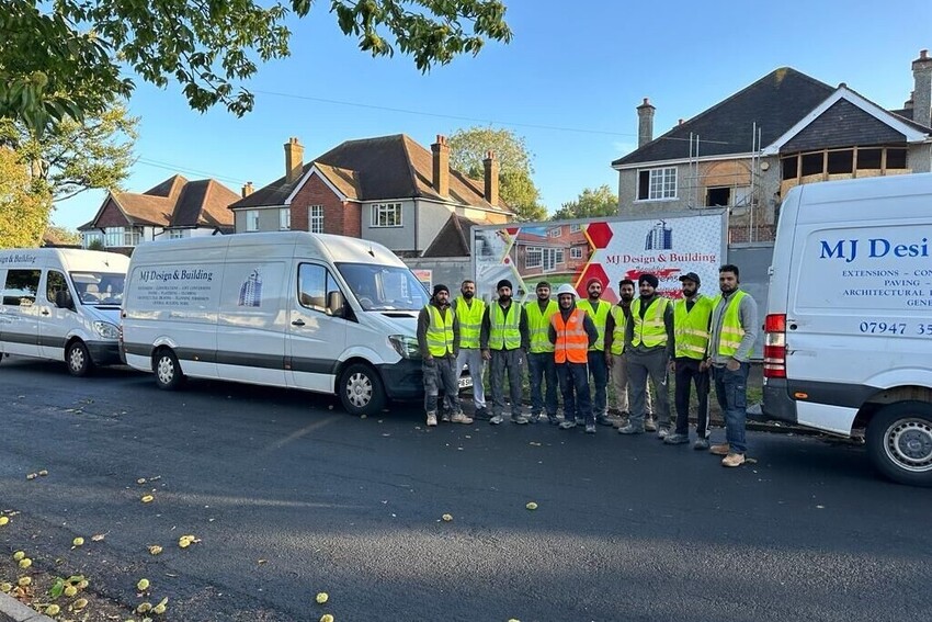 MJ Design and Building team on site with company van